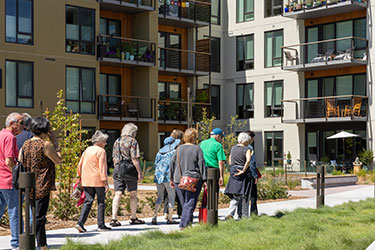Group walking at Enso Village