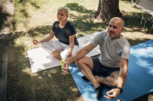 Senior couple doing daily meditation